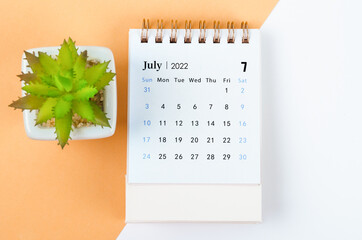 July 2022 desk calendar with tree pot.