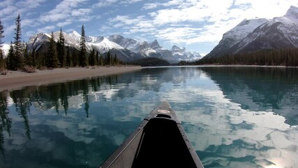 Canoeing on Maligne lake with Canadian rockies in Spirit island at Jasper national park