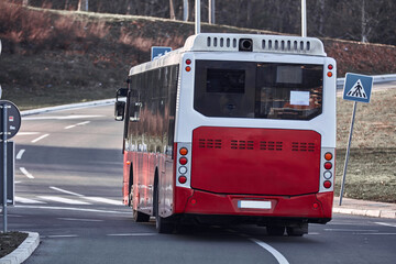 Fototapeta na wymiar Public transportation bus in urban surroundings.