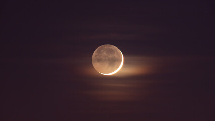 Young crescent Moon with 7% phase.