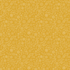 Vector seamless winter background consisting of snowflakes of different shapes placed chaotically. Snowflakes placed on gold background. Christmas and new year symbol and mood.