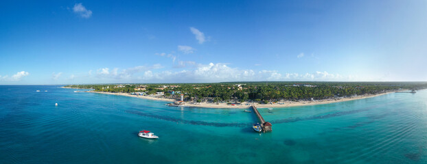 Dominicus beach at Bayahibe with Caribbean sea sandy seashore. Panorama from drone.
