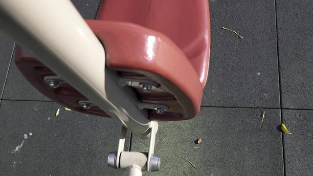 Power push facility in the park. Fitness equipment for middle-aged and elderly people. 