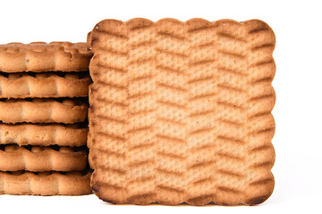 Square shortbread cookies close-up on a white background. Baked milk cookies. Confectionery.