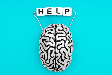 Human brain asking for help isolated on blue