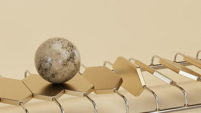 Marble ball rolling on champagne color slabs satisfying looping minimalistic background