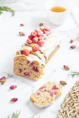 Delicious Raspberry loaf cake or loaf bread with lemon glaze.
