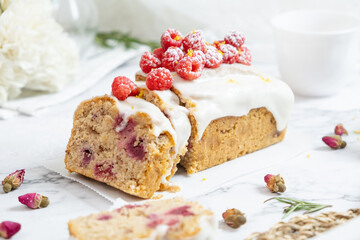Delicious Raspberry loaf cake or loaf bread with lemon glaze.
