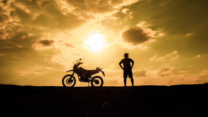 Fototapeta na wymiar Tourists with motorcycles, motocross. Adventure tourists on motorcycles. men's holiday event ideas