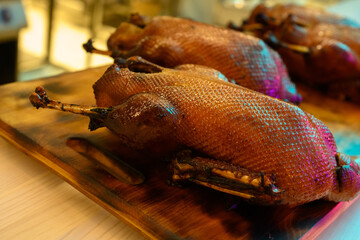 Duck baked on a wooden board