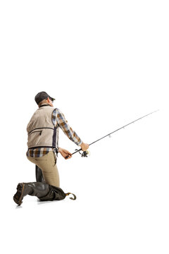 Portrait of young man, professional fisherman with fishing rod, spinning and equipment going to river isolated over white studio background