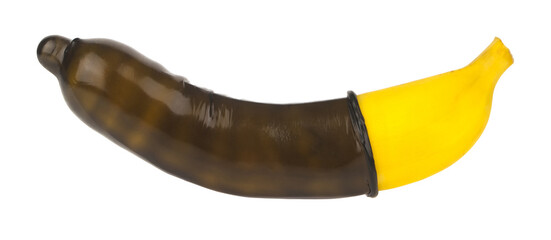 Banana in black condom isolated on white background.