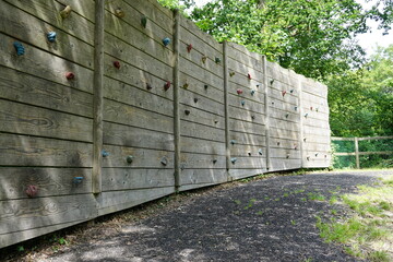 children's play park equipment. Climbing wall for kids at a playground. activity and exercise concept for youth. 