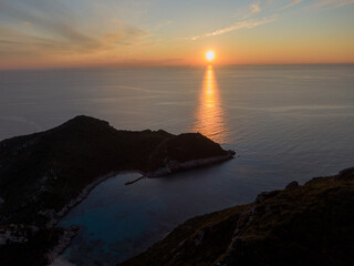Afionas porto timoni sunset in corfu drone view 
