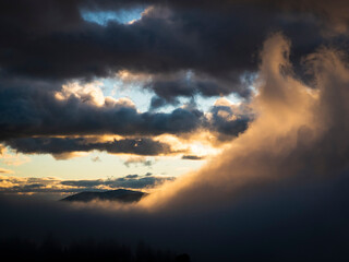 Fototapeta na wymiar Clouds glow with the rising sun .