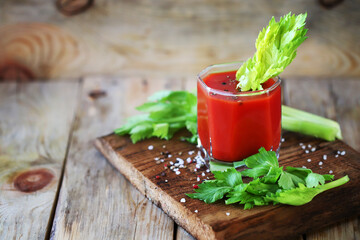 Bloody mary cocktail with celery.