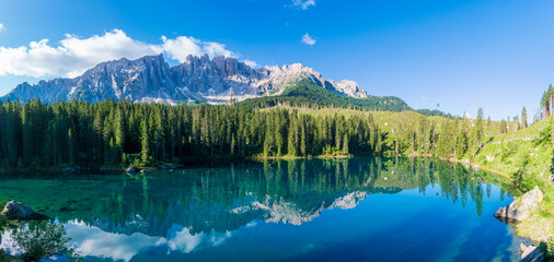 bleu lake in the dolomites Italy, Carezza lake Lago di Carezza, Karersee with Mount Latemar,...