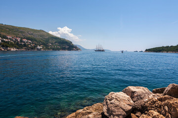 The entrance to the old harbour (Stara Luka), Dubrovnik, Croatia, with ships anchored in the roadstead beyond