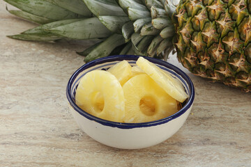 Marinated pineapple rings in the bowl