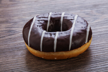Glazed sweet tasty chocolate donut