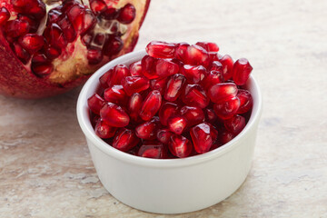 Ripe red Pomegranate seeds in the bowl