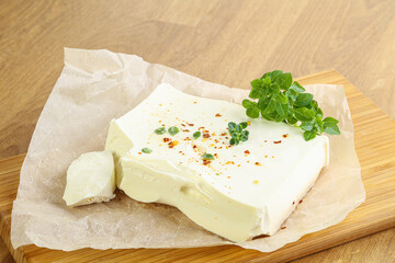Greek Feta cheese over board
