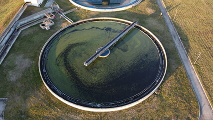 Aerial view of a wastewater treatment plant. During purification, chemicals and microorganisms are removed from the water and the water is returned to river and sea watercourses.