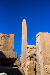 EGYPT - KARNAK TEMPLE - Travel tour group wanders through Karnak Temple. Beautiful Egyptian landmark with hieroglyphics, decayed temples, obelisks, towers, and other buildings. Luxor, Egypt