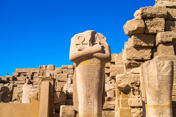 EGYPT - KARNAK TEMPLE - Large sculptures of pharaohs inside beautiful Egyptian landmark with...