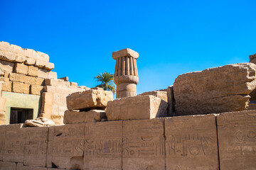  EGYPT - KARNAK TEMPLE - Large sculptures of pharaohs inside beautiful Egyptian landmark with...