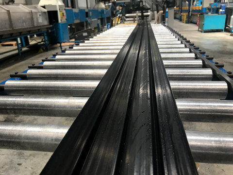 Large-size rubber profile being extruded in rubber factory