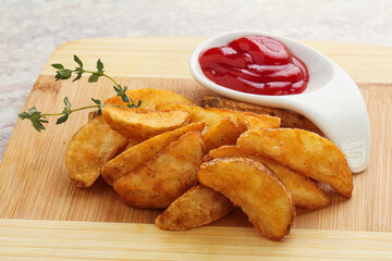 Fried rustic potato with tomato ketcup