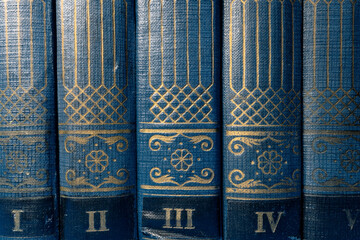 Ancient books in blue leather binding. Volumes of old books