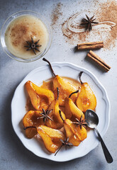 Poached pears with spices homemade dessert.
