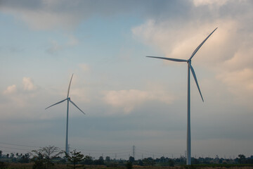 wind turbines in the field. Wind Turbines generating electricity on blue sky