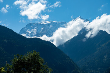 View from Saint-Gervais-les-Bains to white top of Mont Blanc mountaine range in summer