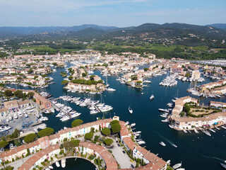 Naklejka premium Aerial view on small houses and sailboats of Port Grimaud and port Cogolin, French Riviera, Provence, France