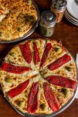 mozzaerela and bell pepper pizza on wood