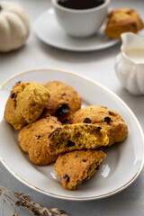 Pumpkin cookies with chocolate chips. Homemade cookies, ugly food concept.