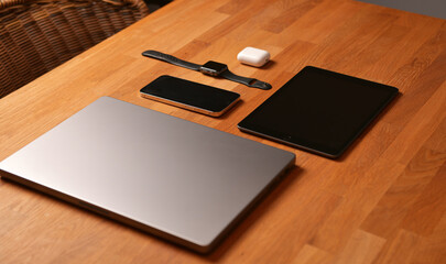 Working from home. A lot of electronic smart devices like laptop, smartphone, tablet, smartwatch...