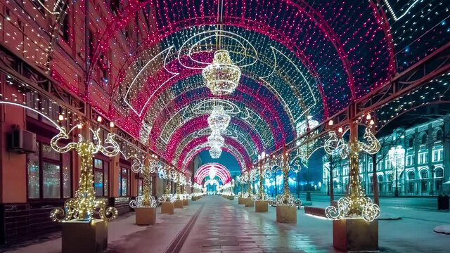 Street decorated for New Year and Christmas. Night winter snow Moscow, Russia, December 19, 2021. High quality 4k footage
