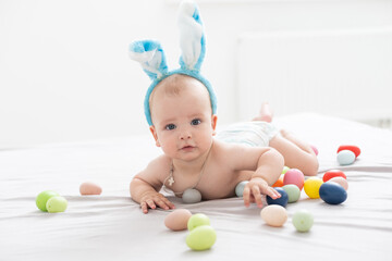 Fototapeta na wymiar Cute little boy with bunny ears, Easter
