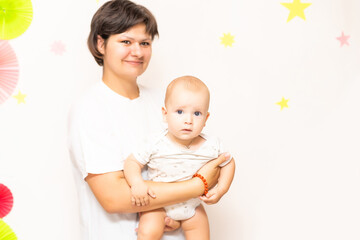 happy mother holding her baby