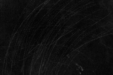 Random scratches on a black concrete wall surface for texture background