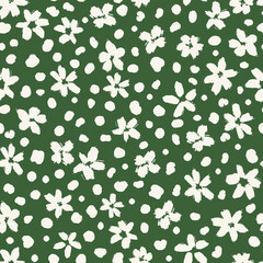 Cute ditsy daisies with dots all over print on green background. Random placed, vector flowers and stains seamless repeat pattern. Minimal print for apparel, surfaced, backgrounds etc.