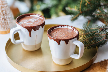 Cups of Hot Chocolate in a festive decoration, excellent illustration of warm drink for celebration and comfort 