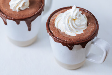 Cups of Hot Chocolate in a festive decoration, excellent illustration of warm drink for celebration and comfort 