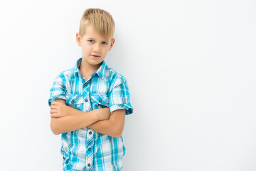 Portrait of happy little boy over white background