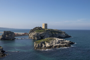 Fototapeta na wymiar Castle on a rocky island over the sea