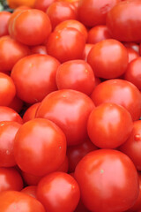 Red ripe tomatoes. Food background.